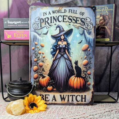 bord met de tekst “In a world full of princesses, be a witch”